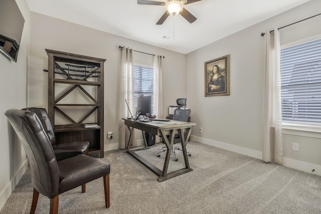 home office featuring carpet and ceiling fan