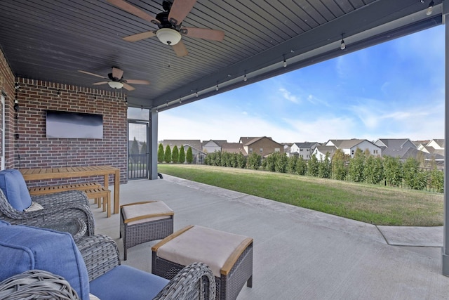 view of patio / terrace featuring ceiling fan