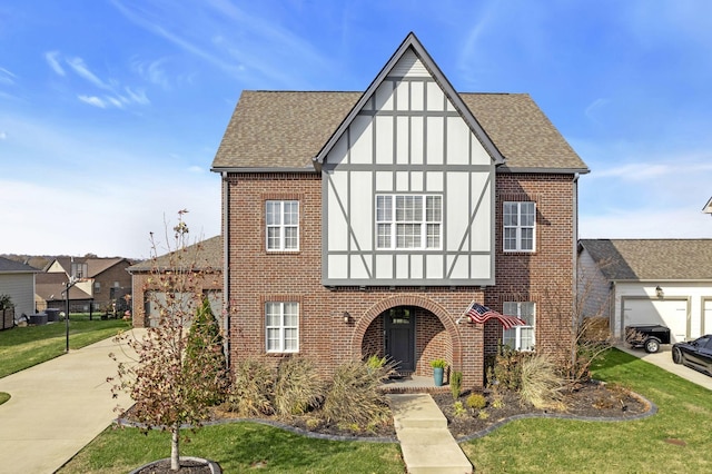 tudor house with a front lawn