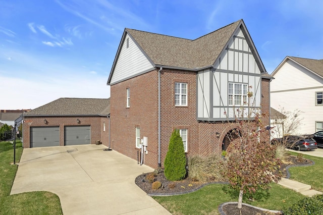 view of side of property with a garage