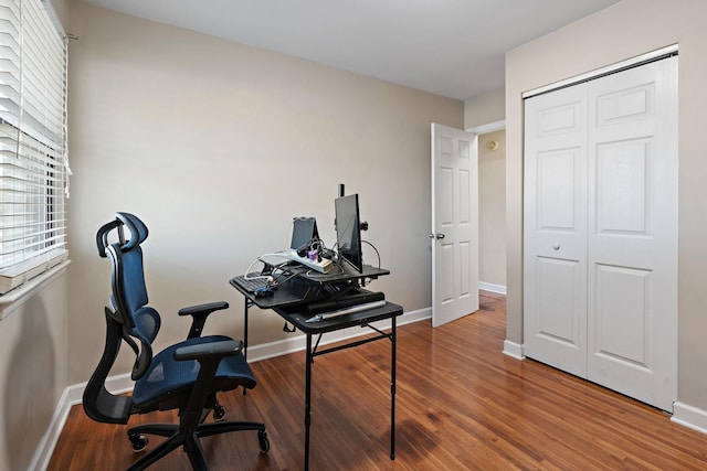 home office featuring hardwood / wood-style floors