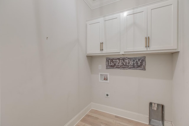 laundry area with cabinets, washer hookup, hookup for an electric dryer, and light hardwood / wood-style floors