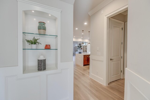 hall with light hardwood / wood-style floors