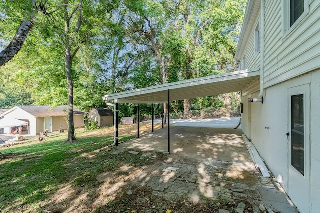 exterior space with a carport