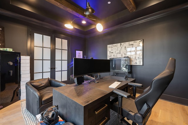 home office featuring beamed ceiling, french doors, light wood-type flooring, and crown molding