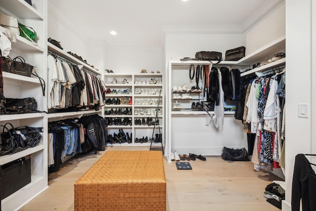 walk in closet featuring light wood-type flooring