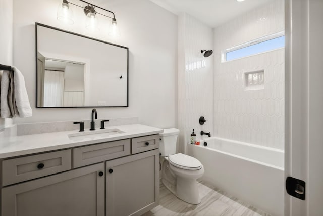 full bathroom featuring shower / tub combination, vanity, and toilet