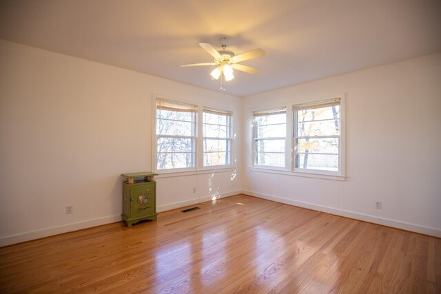 432 Menees Ln, Madison, TN 37115 - spare room with ceiling fan, light wood-style flooring, and baseboards