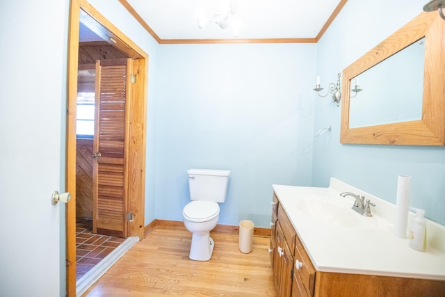 432 Menees Ln, Madison, TN 37115 - bathroom with vanity, crown molding, toilet, wood finished floors, and baseboards