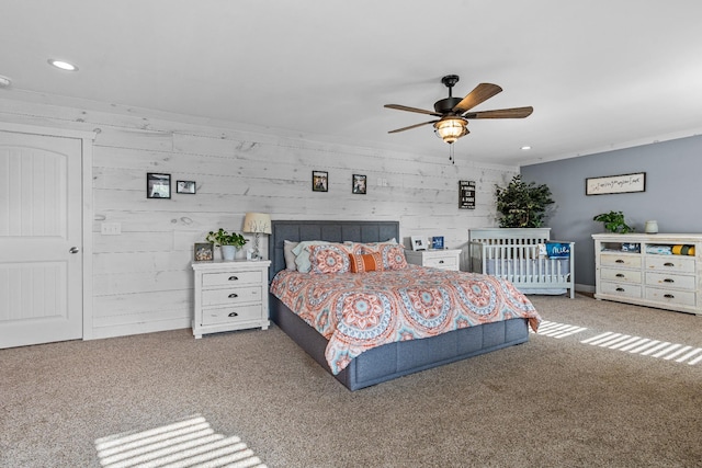 bedroom with ceiling fan and carpet