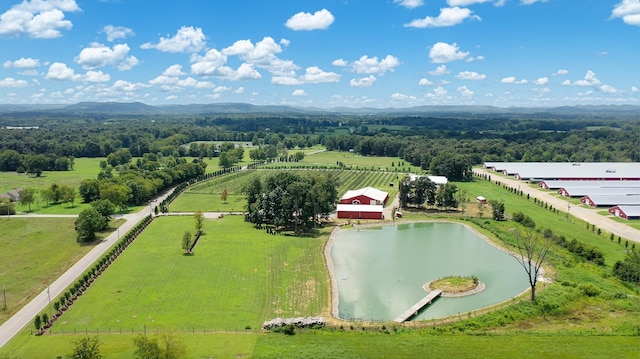 bird's eye view with a rural view and a water view