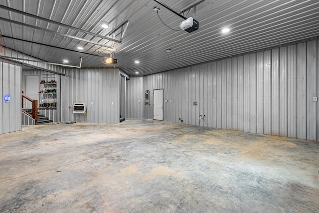 garage with heating unit and a garage door opener