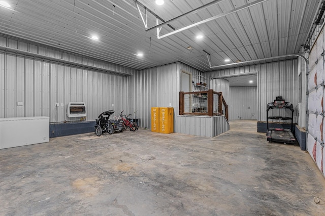 garage featuring heating unit