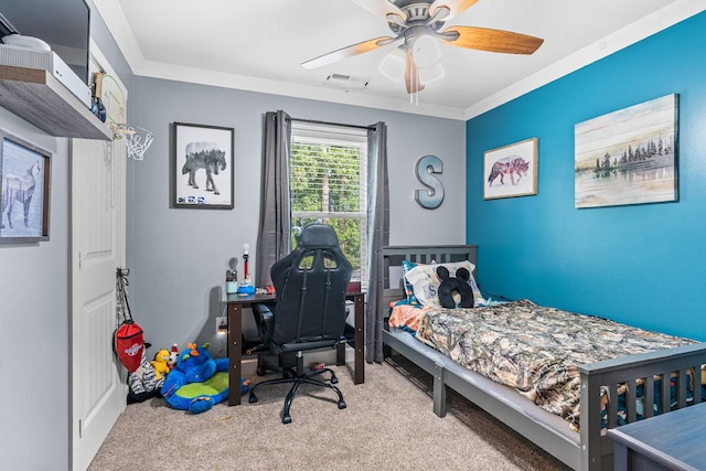 bedroom with ceiling fan, ornamental molding, and light colored carpet