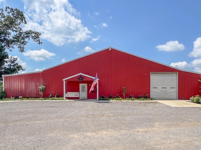 view of outbuilding featuring a garage