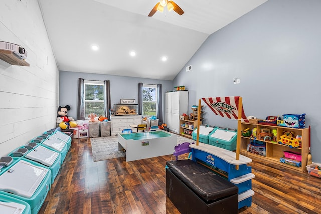 playroom with ceiling fan, vaulted ceiling, and dark hardwood / wood-style floors