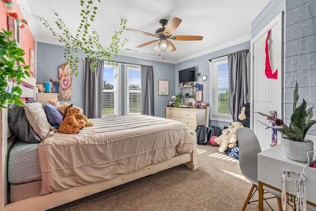 bedroom with ornamental molding, multiple windows, ceiling fan, and carpet