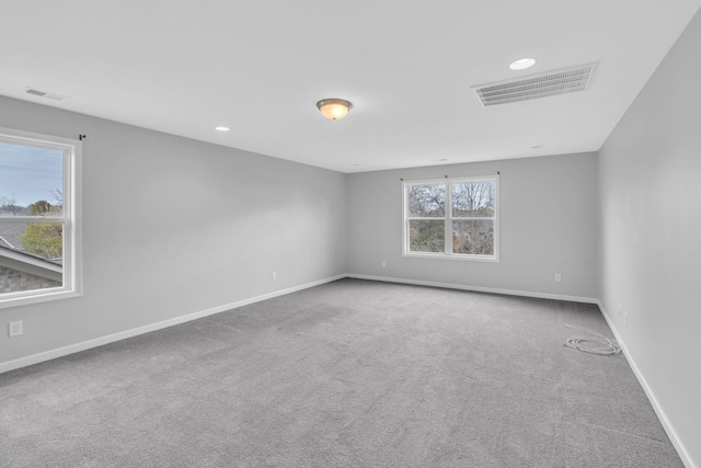 unfurnished room with carpet flooring