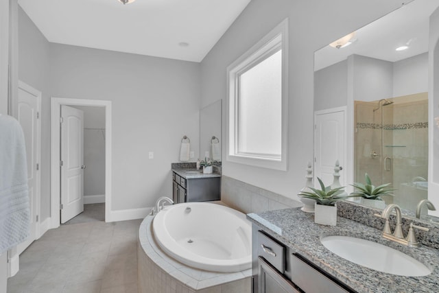 bathroom featuring separate shower and tub, tile patterned flooring, and vanity