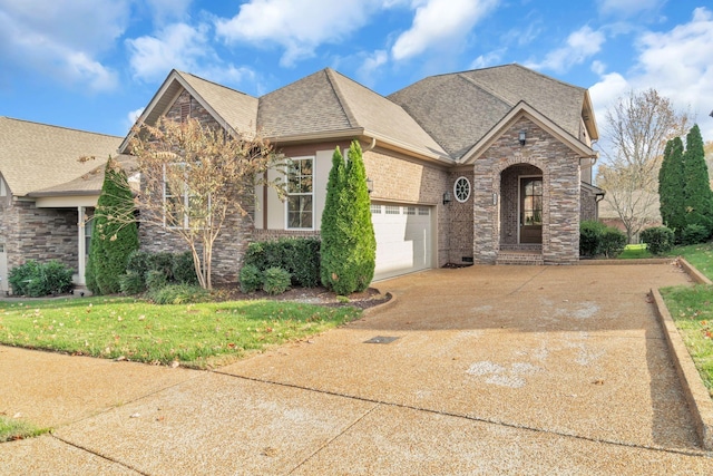 french country inspired facade with a garage and a front yard