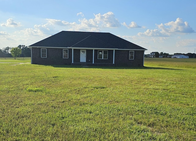 single story home featuring a front yard