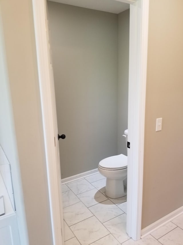 bathroom featuring toilet