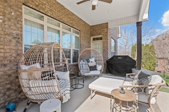 view of patio with ceiling fan and area for grilling