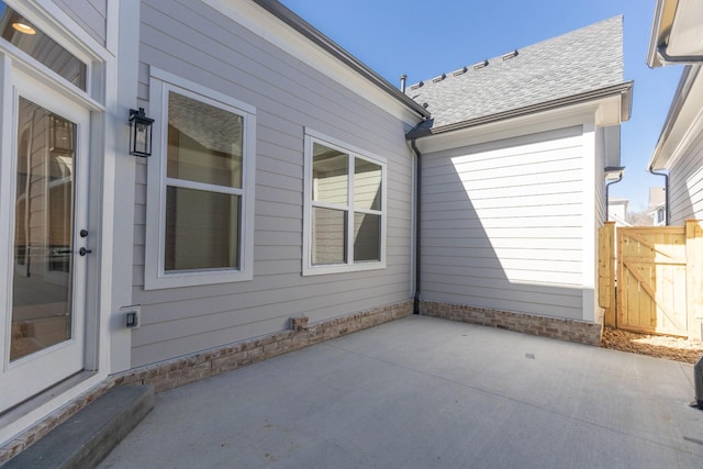 view of patio / terrace featuring fence