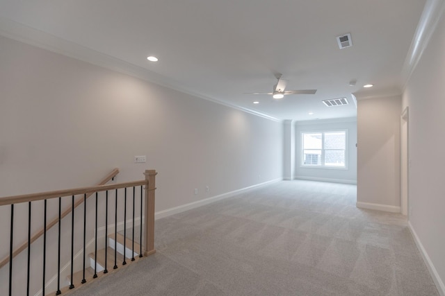 unfurnished room featuring crown molding, recessed lighting, baseboards, and visible vents