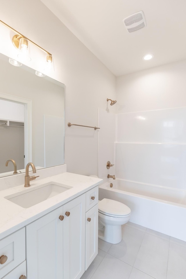 full bath with visible vents, toilet, vanity, and tile patterned flooring