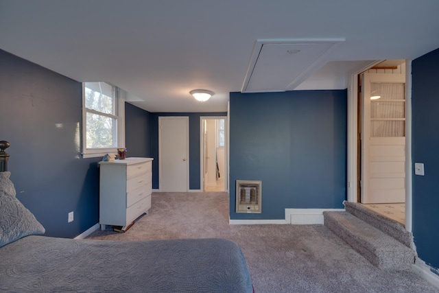 carpeted bedroom featuring heating unit