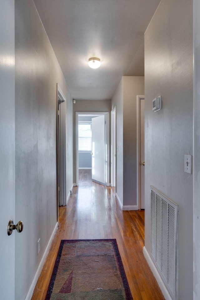 hallway featuring light wood-type flooring