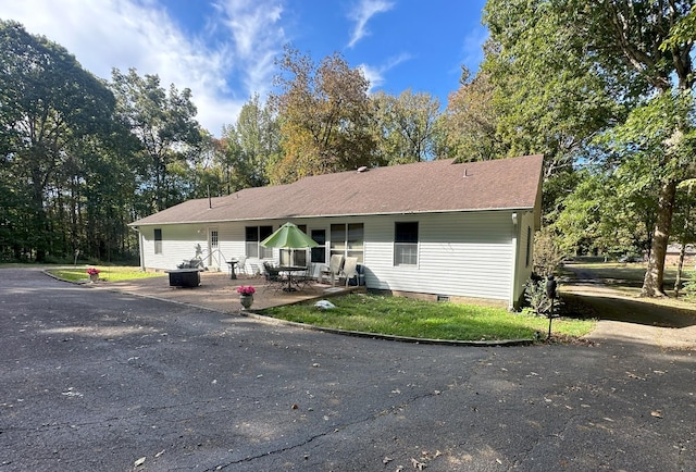 view of front of property with a patio