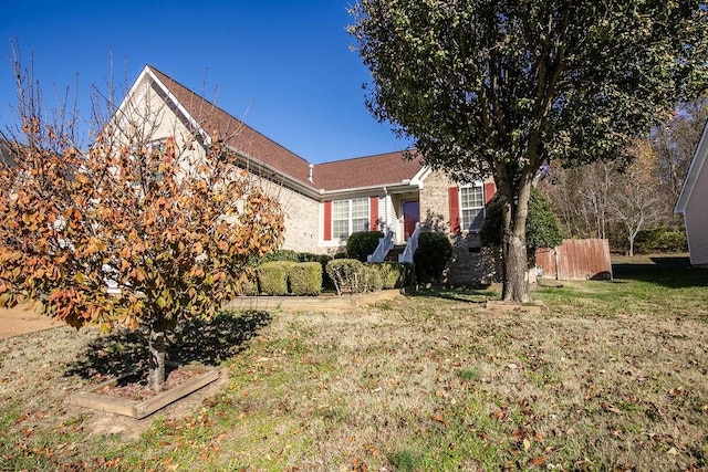 view of front of home with a front lawn