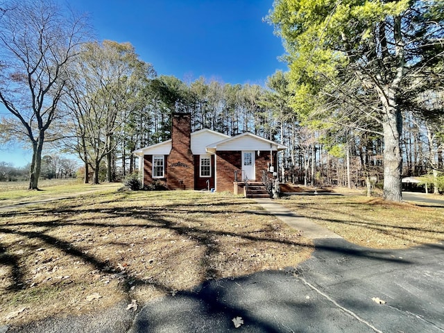 view of property exterior featuring a yard