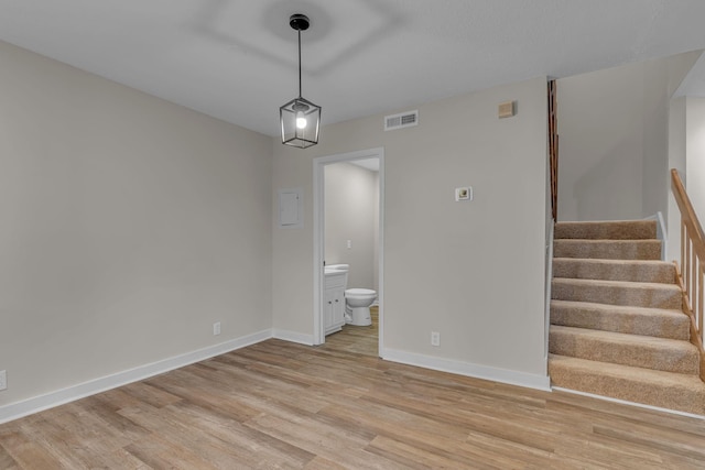 unfurnished room featuring light wood-type flooring