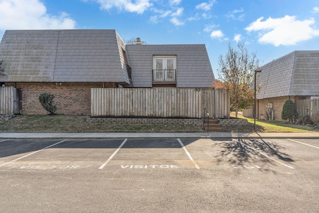 view of parking / parking lot with french doors