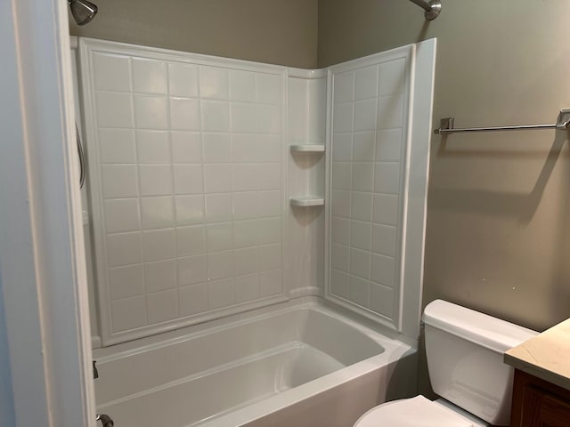 full bathroom featuring vanity, toilet, and tiled shower / bath combo