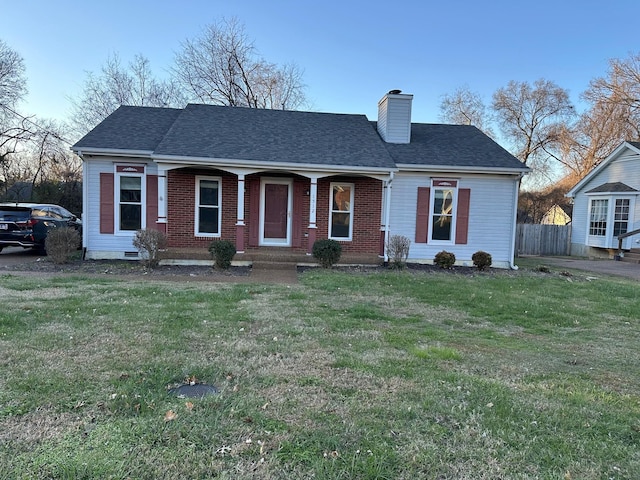 view of front facade with a front yard and a porch