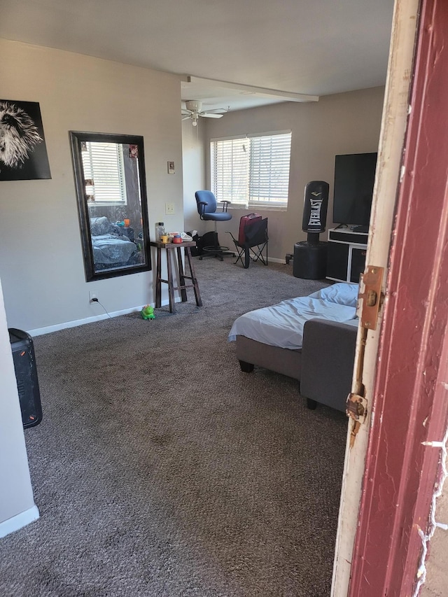 bedroom featuring ceiling fan and carpet floors