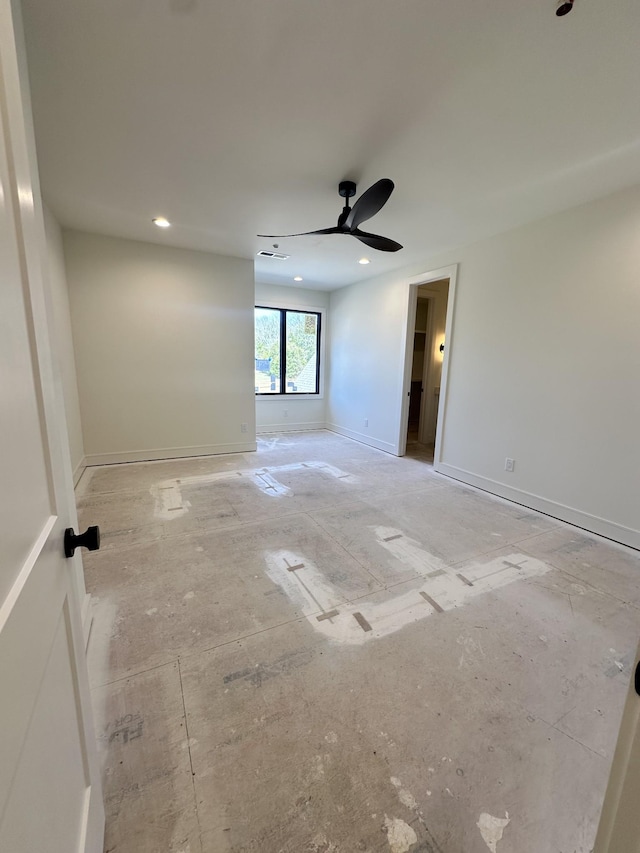 empty room with ceiling fan, recessed lighting, and baseboards