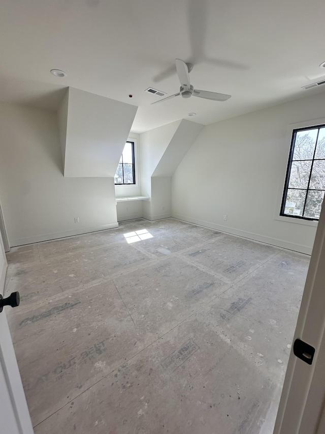 bonus room with ceiling fan and visible vents