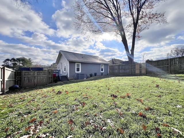 view of yard with central AC