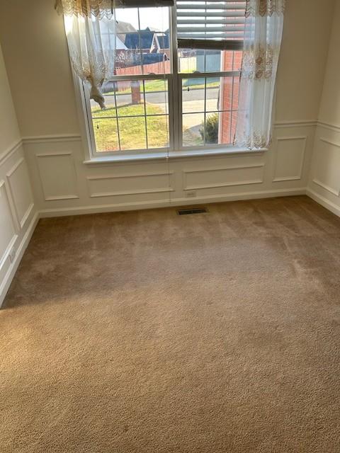 spare room with carpet floors