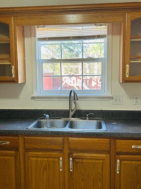 kitchen featuring a healthy amount of sunlight and sink