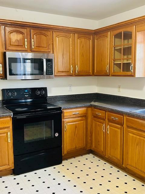 kitchen with black / electric stove