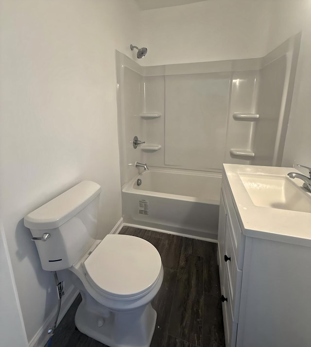 full bathroom featuring wood-type flooring, vanity, shower / bath combination, and toilet