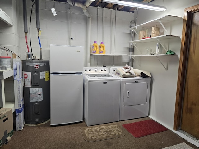 clothes washing area with washing machine and clothes dryer, electric water heater, and carpet flooring