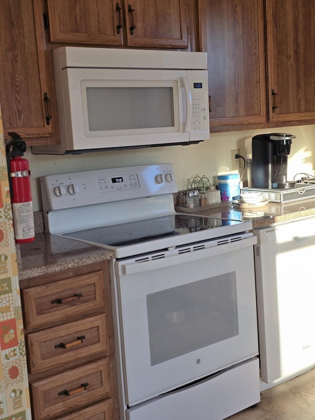 kitchen featuring white appliances