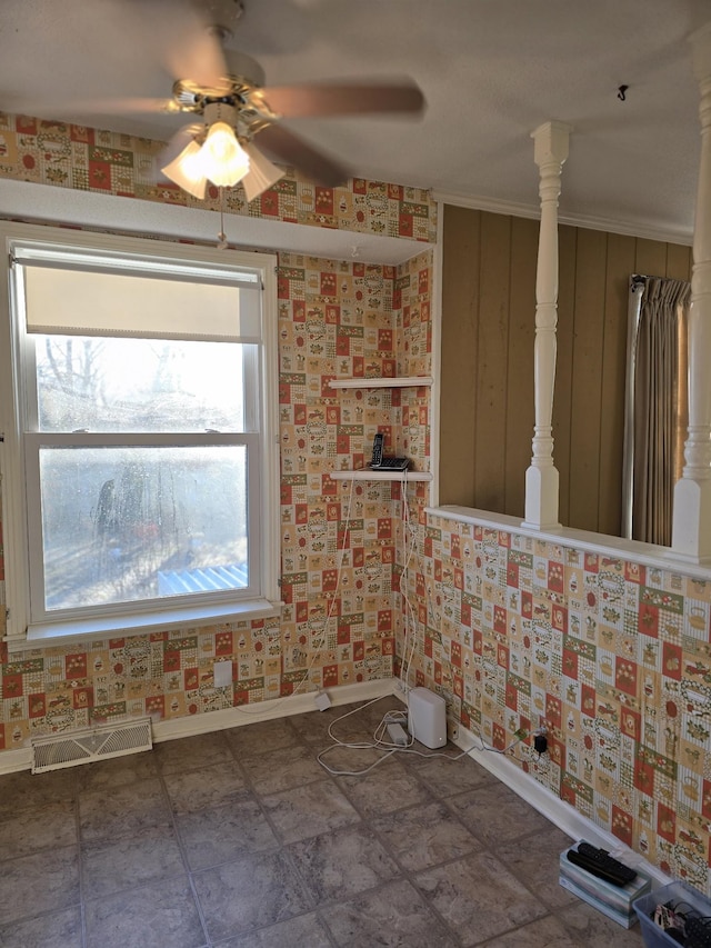 bathroom with ceiling fan and crown molding